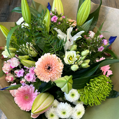 Cool Breeze - This classical stylish collection of flowers, make this hand tied the perfect gift. Flowers professionally arranged and delivered by a local florist.